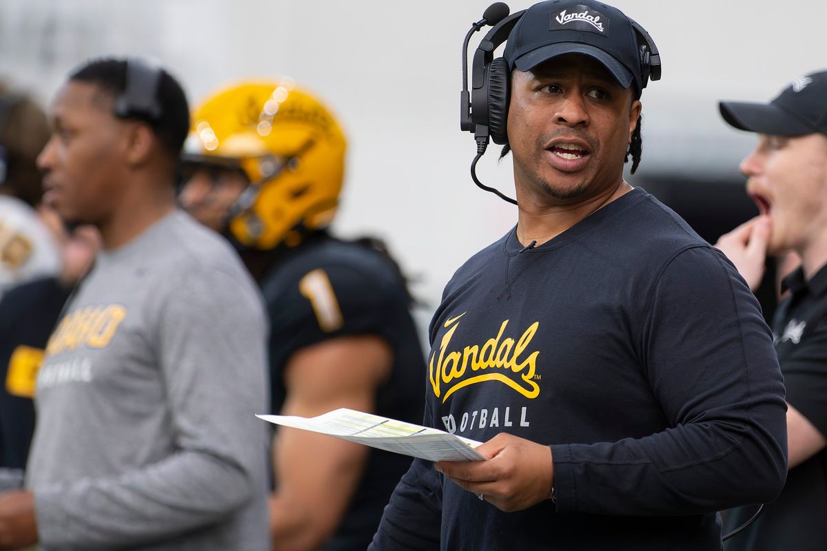 Idaho head football coach Thomas Ford Jr. leads the team