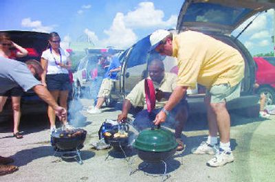 
If you can't make it to your team's game, consider attending a local match-up instead — and don't forget the barbecue for tailgating! 
 (MultiAd / The Spokesman-Review)
