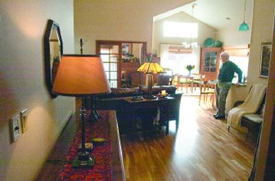 
Tom Talkington stands at the kitchen counter of his home. Talkington and his wife, Rosemarie, traveled the world during his military career before retiring to the Spokane area. 
 (photos by Christopher Anderson/the spokesman-review / The Spokesman-Review)