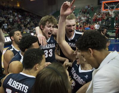 Gonzaga celebrates their 85-75 win over St. Mary's at the West Coast Conference tournament championship final college basketball game tonight at the Orleans Arena in Las Vegas. (Colin Mulvany/photo)