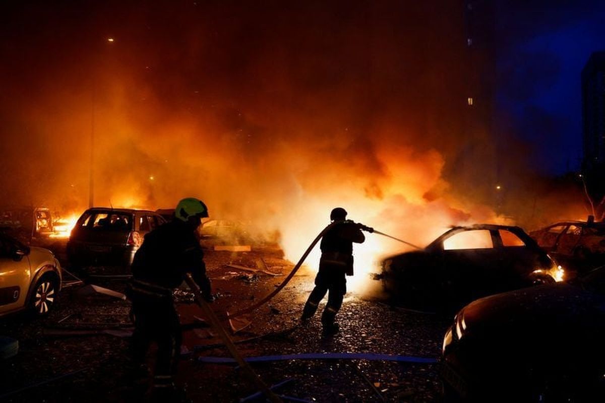 A firefighter works at the site of residential apartment buildings, which were heavily damaged during Russian missile and drone strikes, amid Russia