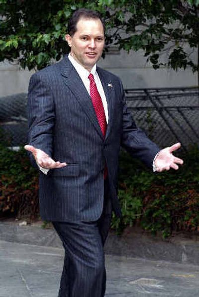 
U.S. Secret Service laboratory director Larry Stewart arrives Tuesday at Manhattan Federal court for his arraignment. Stewart pleaded innocent to charges he lied repeatedly on the witness stand while testifying for the government at the Martha Stewart trial.
 (Associated Press / The Spokesman-Review)