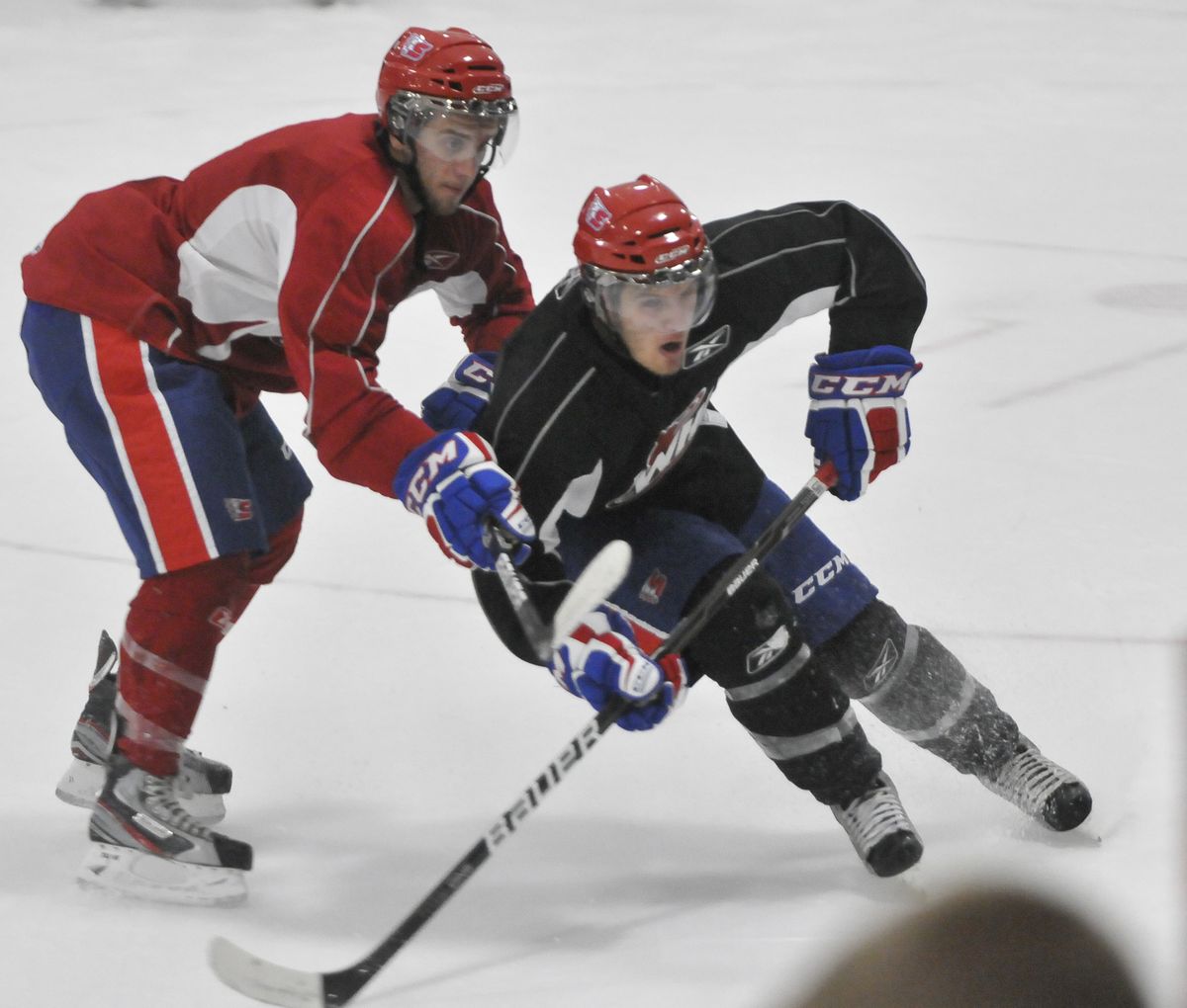 Defenseman Brenden Kichton, right, had a breakout season for the Spokane Chiefs last year with 23 goals and 58 assists. (Jesse Tinsley)