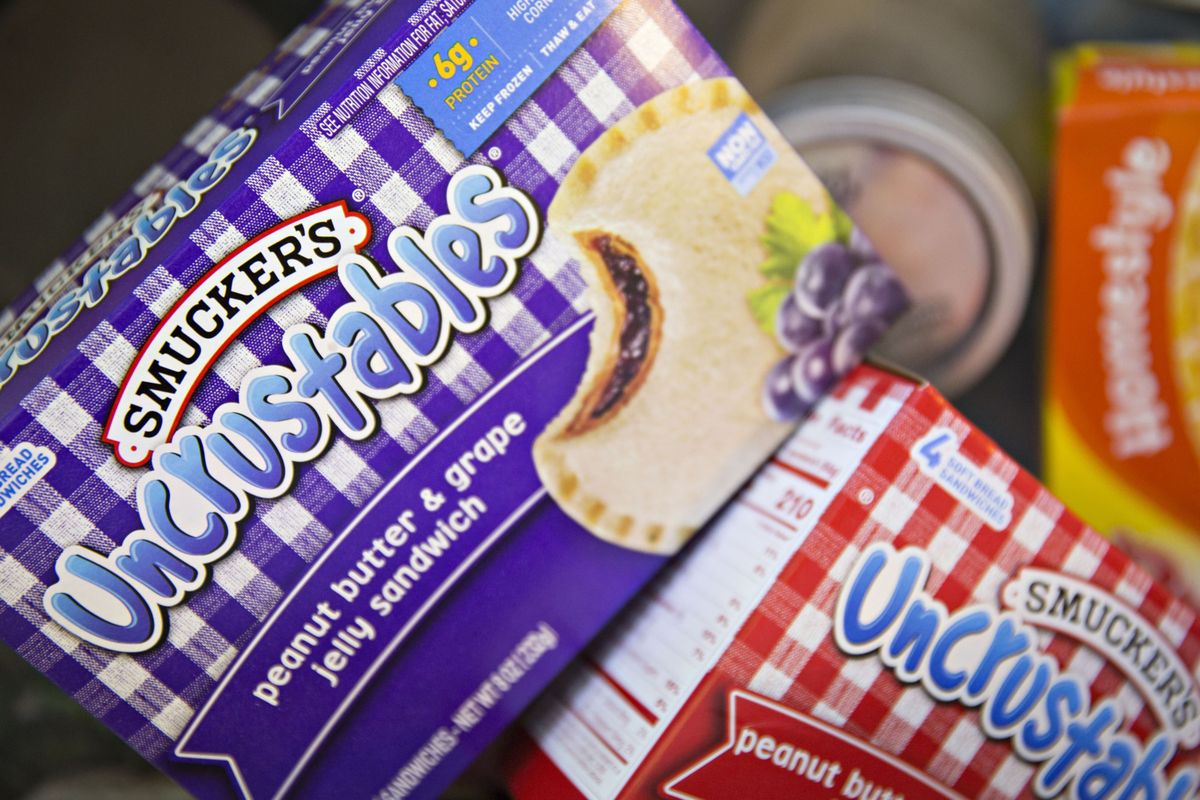 A box of J.M. Smucker Co. Smucker’s Uncrustables brand peanut butter and grape jelly sandwiches is arranged for a photograph in Tiskilwa, Illinois, on June 6, 2017.  (Daniel Acker/Bloomberg)