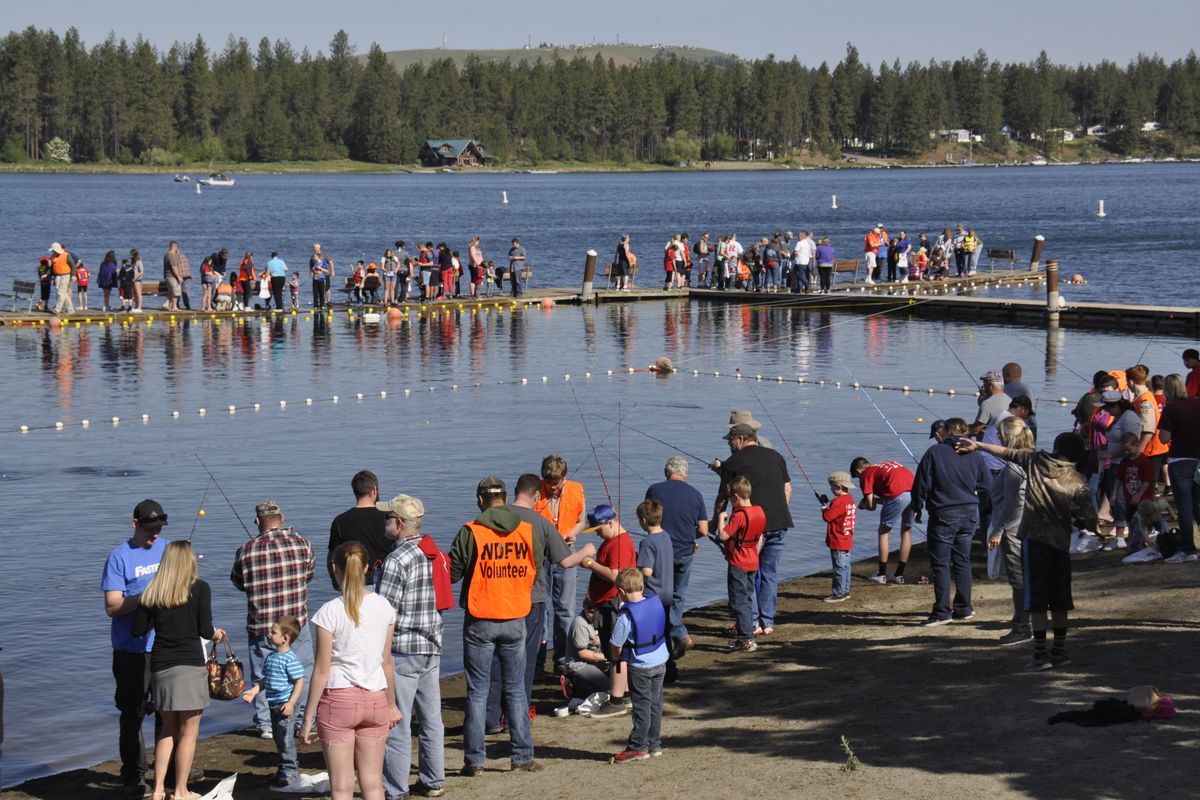 More than 800 youths and their families take part each year in Kid Fishing Day at Clear Lake. (Rich Landers)