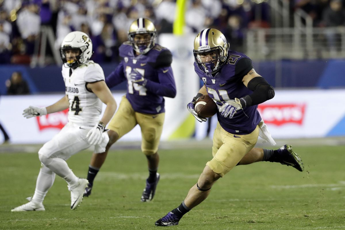 Washington defensive back Taylor Rapp (21) intercepts a Colorado pass during the second half of the Pac-12 Conference championship NCAA college football game Friday, Dec. 2, 2016, in Santa Clara, Calif. Rapp had two interceptions, the first giving the Huskies a 21-7 lead early in the third quarter. (Marcio Jose Sanchez / Associated Press)