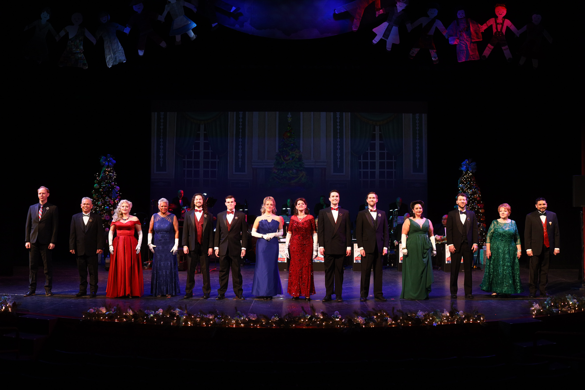 Adult singers pose in SVST