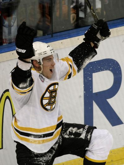 Tyler Seguin of the Boston Bruins celebrates after scoring against the Phoenix Coyotes during an NHL hockey game in Prague. (Associated Press)