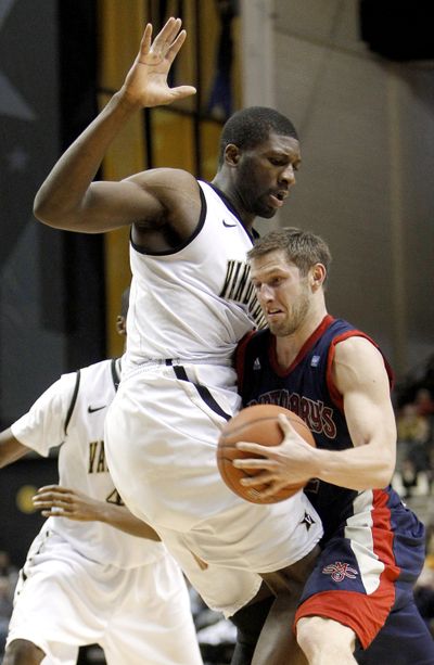 Guard Mickey McConnell, right, has led Saint Mary’s to the top of the West Coast Conference standings.  (Associated Press)