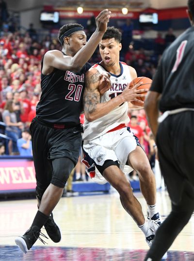 Gonzaga’s Brandon Clarke drives against Central Washington’s Malcolm Cola  on Thursday at McCarthey Athletic Center. The Zags handled the Wildcats 108-69 in an exhibition game. (Jesse Tinsley / The Spokesman-Review)