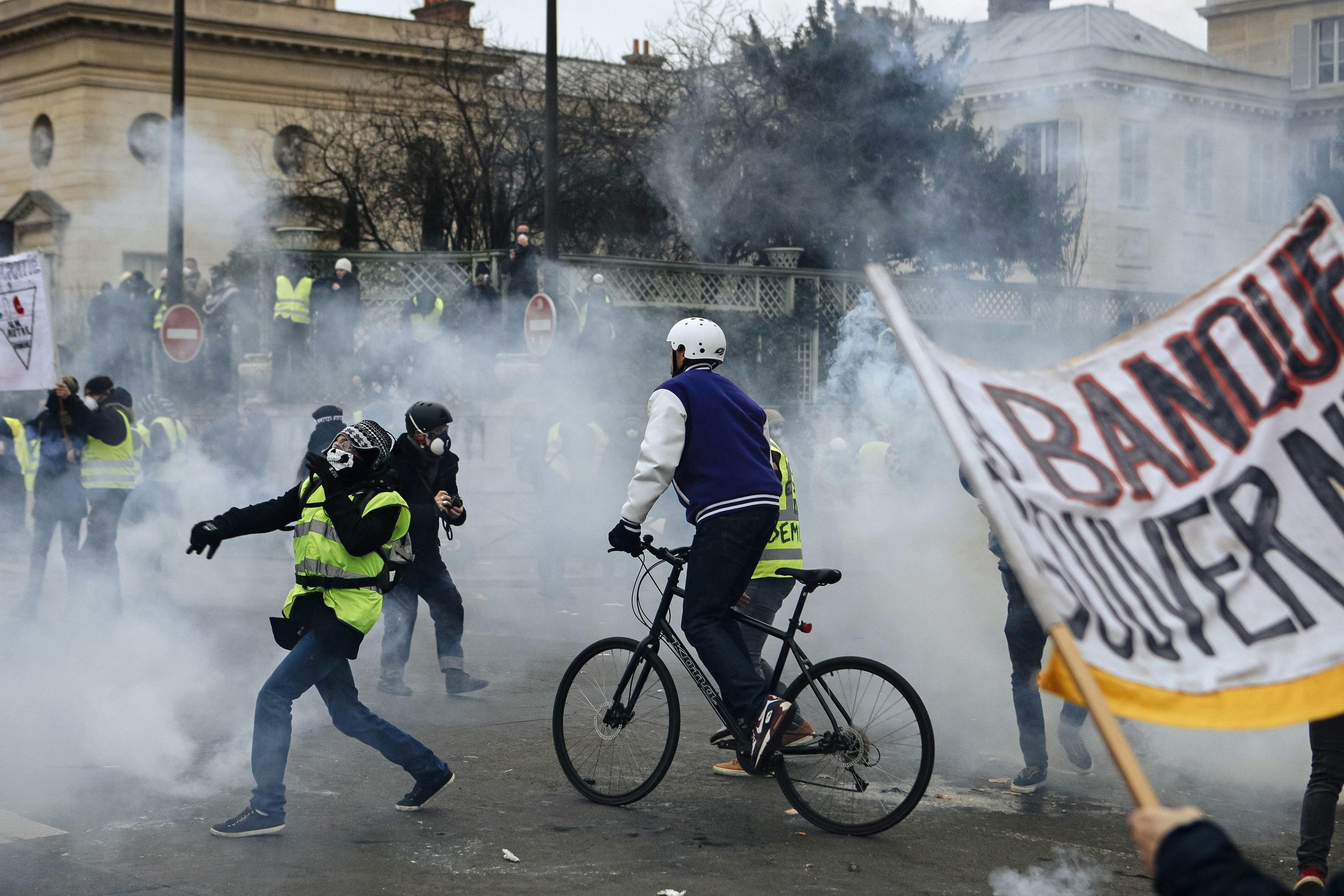 France’s first yellow vest protests of new year brings tear gas, fires