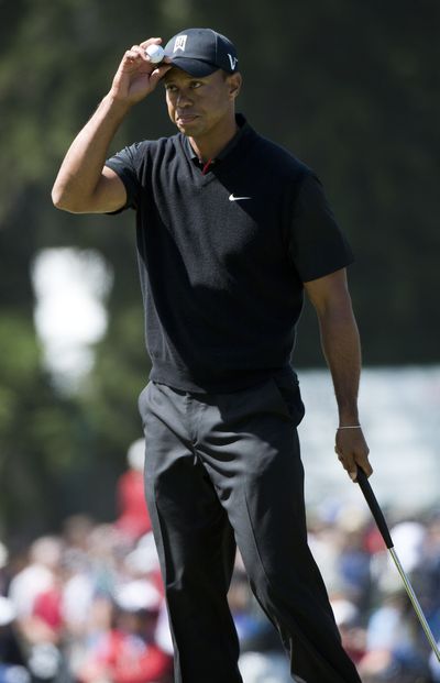 Tiger Woods reacts after he made par on No. 9 during the second round of the U.S. Open golf tournament, Friday, June 15, 2012, at Olympic Club in San Francisco. (Paul Jr. / The Sacramento Bee)