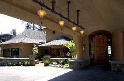 The front entrance of the home on Sanders Beach shows off the Tuscan theme of the architecture. It was designed by architect Rann Haight
(The Spokesman-Review)