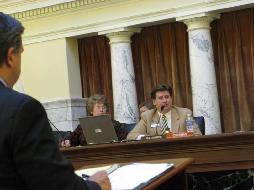 Senate Finance Chairman Dean Cameron, R-Rupert, questions state schools Supt. Tom Luna on Thursday during the school budget hearing. (Betsy Russell)