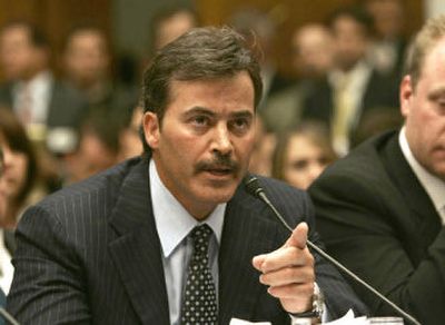 
Baltimore Orioles first baseman Rafael Palmeiro would draw jeers from fans everywhere when six weeks after he told a congressional panel he never used steroids he failed a steroid test. 
 (Associated Press / The Spokesman-Review)