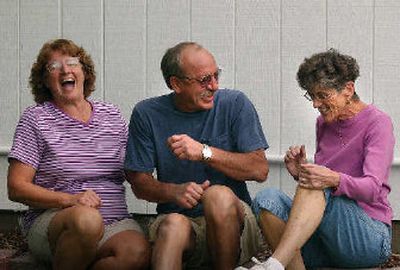 
From left, Amy and Jeff Gleaton share a laugh with neighbor and close friend Sandy Westrope in the Gleaton backyard last year. The Gleatons, nominated by Westrope, were the winners in the Valley Good Neighbor contest in 2005.
 (File / The Spokesman-Review)