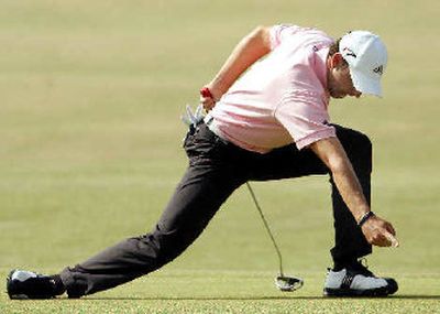 
Sergio Garcia celebrates after getting an eagle on the ninth hole.  
 (Associated Press / The Spokesman-Review)