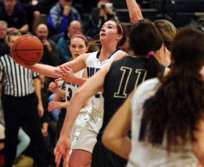 Gonzaga Prep's Hannah Caudill looks to the basket during the first half of a GSL girls basketball game, Tuesday Jan. 28, 2014, at Gonzaga Prep. (Colin Mulvany / The Spokesman-Review)