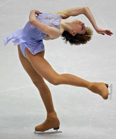 
Sarah Hughes competes in the  2002 Winter Olympics in Salt Lake City. Hughes canceled an earlier Spokane appearance because of an injury. She will perform Thursday at the Spokane Arena as part of  the  Smucker's Stars on Ice tour.
 (Associated Press / The Spokesman-Review)