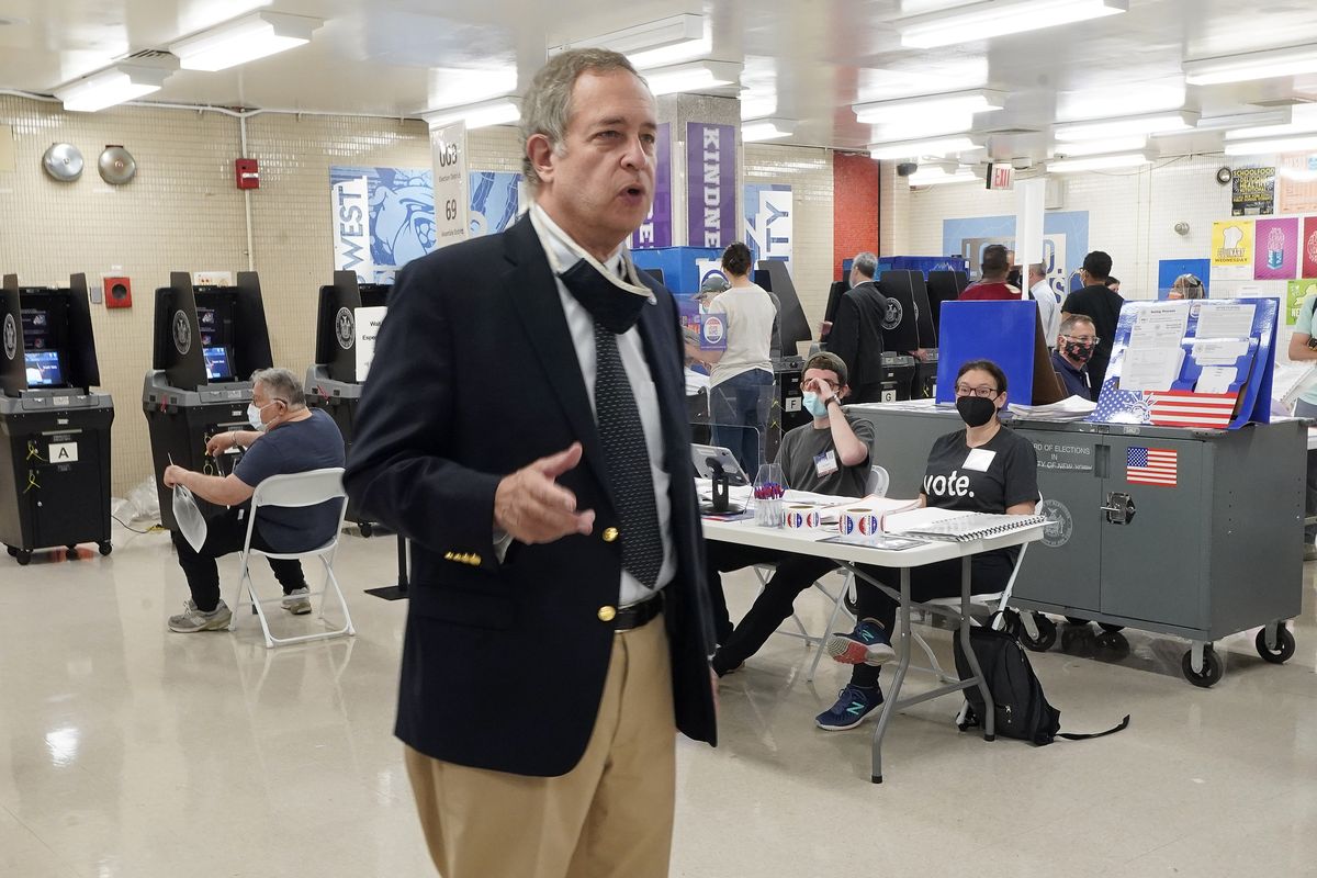 FILE - Frederic Umane, President of the New York City Board of Elections, addresses poll workers at Frank McCourt High School, Tuesday, June 22, 2021, in New York. New York City