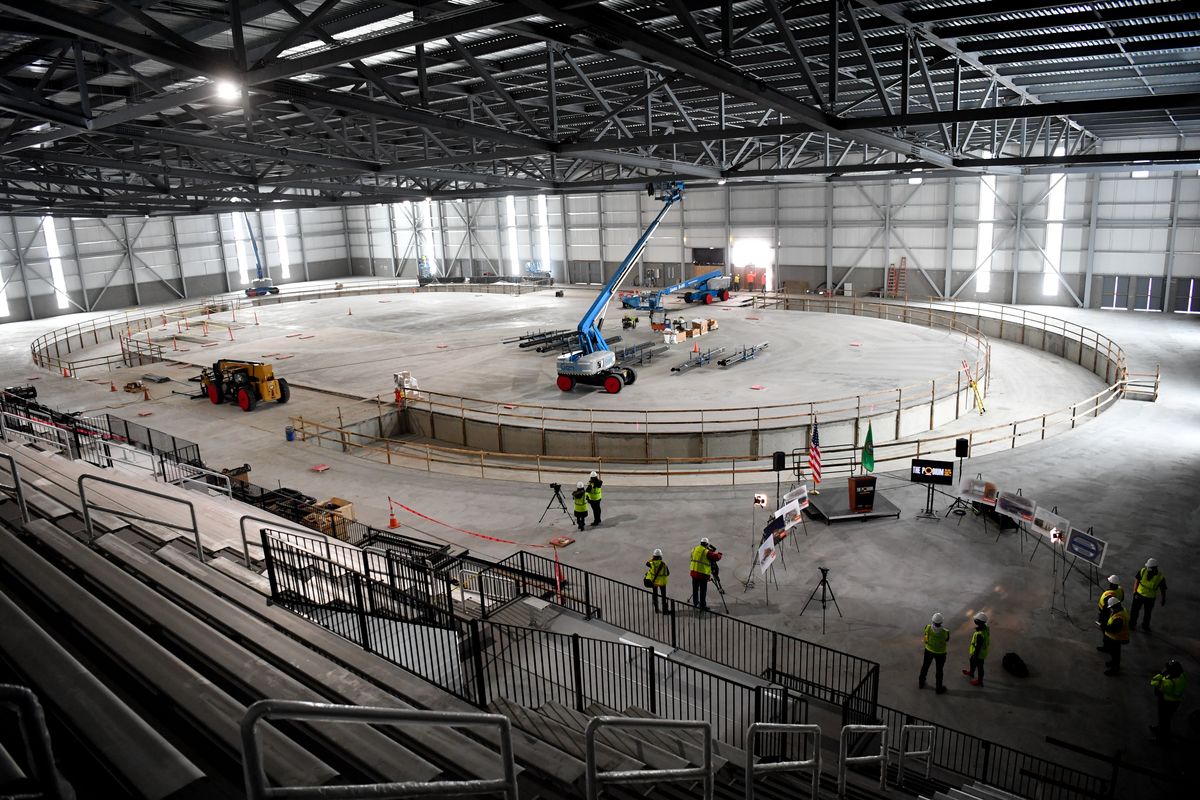 The Podium’s indoor track is seen taking shape during a media tour of the facility on Tuesday, Feb. 16, 2021, in Spokane, Wash. The track will feature a banked surface that is controlled by hydraulics.  (Tyler Tjomsland/THE SPOKESMAN-REVIEW)