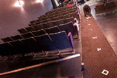 
Lake City Playhouse managing director Noel Barbuto installs new seats Saturday morning in Coeur d'Alene. 
 (Brian Plonka / The Spokesman-Review)