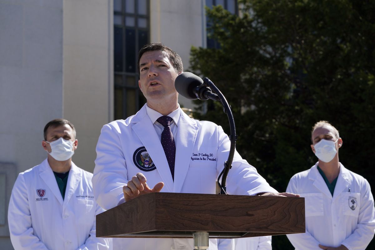 Dr. Sean Conley, physician to President Donald Trump, briefs reporters at Walter Reed National Military Medical Center in Bethesda, Md., Saturday, Oct. 3, 2020. Trump was admitted to the hospital after contracting the coronavirus.  (Susan Walsh)