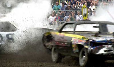 
Mud will fly at this weekend's Demolition Derby Extravaganza at the Lind Lion's Club Arena.
 (File/ / The Spokesman-Review)