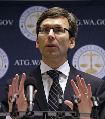 Washington state Attorney General Bob Ferguson speaks at a news conference announcing a multi-million dollar lawsuit against the ride-hailing company Uber, Tuesday, Nov. 28, 2017, in Seattle. (Elaine Thompson / Associated Press)