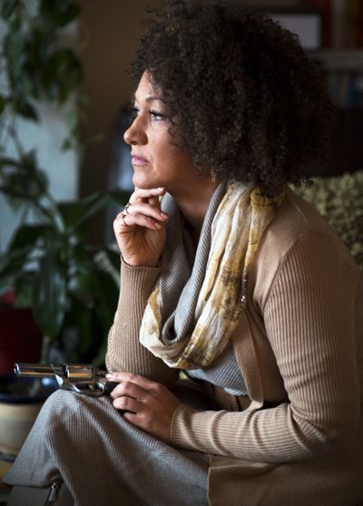 Rachel Dolezal, president of the Spokane chapter of the NAACP, poses in her home with a .44 caliber revolver she owns to protect her family and herself. A package containing racist content directed at her was delivered to the NAACP’s post office box last week. (Colin Mulvany)