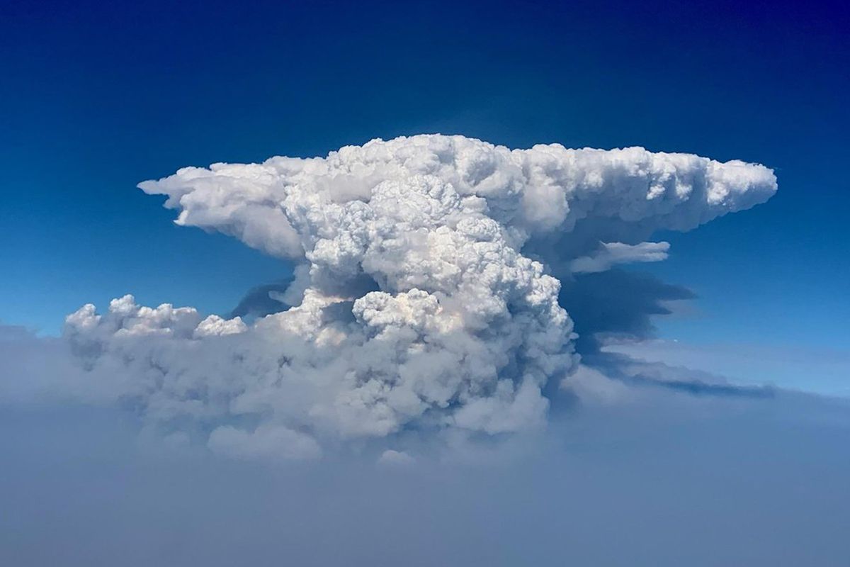 In this photo taken with a drone provided by the Bootleg Fire Incident Command, a pyrocumulus cloud, also known as a fire cloud, is seen over the Bootleg Fire in southern Oregon on Wednesday, July 14, 2021. Smoke and heat from a massive wildfire in southeastern Oregon are creating "fire clouds" over the blaze — dangerous columns of smoke and ash that can reach up to 30,000 feet (9,144 meters) and are visible for more than 100 miles (160 kilometers) away. Authorities have put these clouds at the top of the list of the extreme fire behavior they are seeing on the Bootleg Fire, the largest wildfire burning in the U.S.  (HOGP)