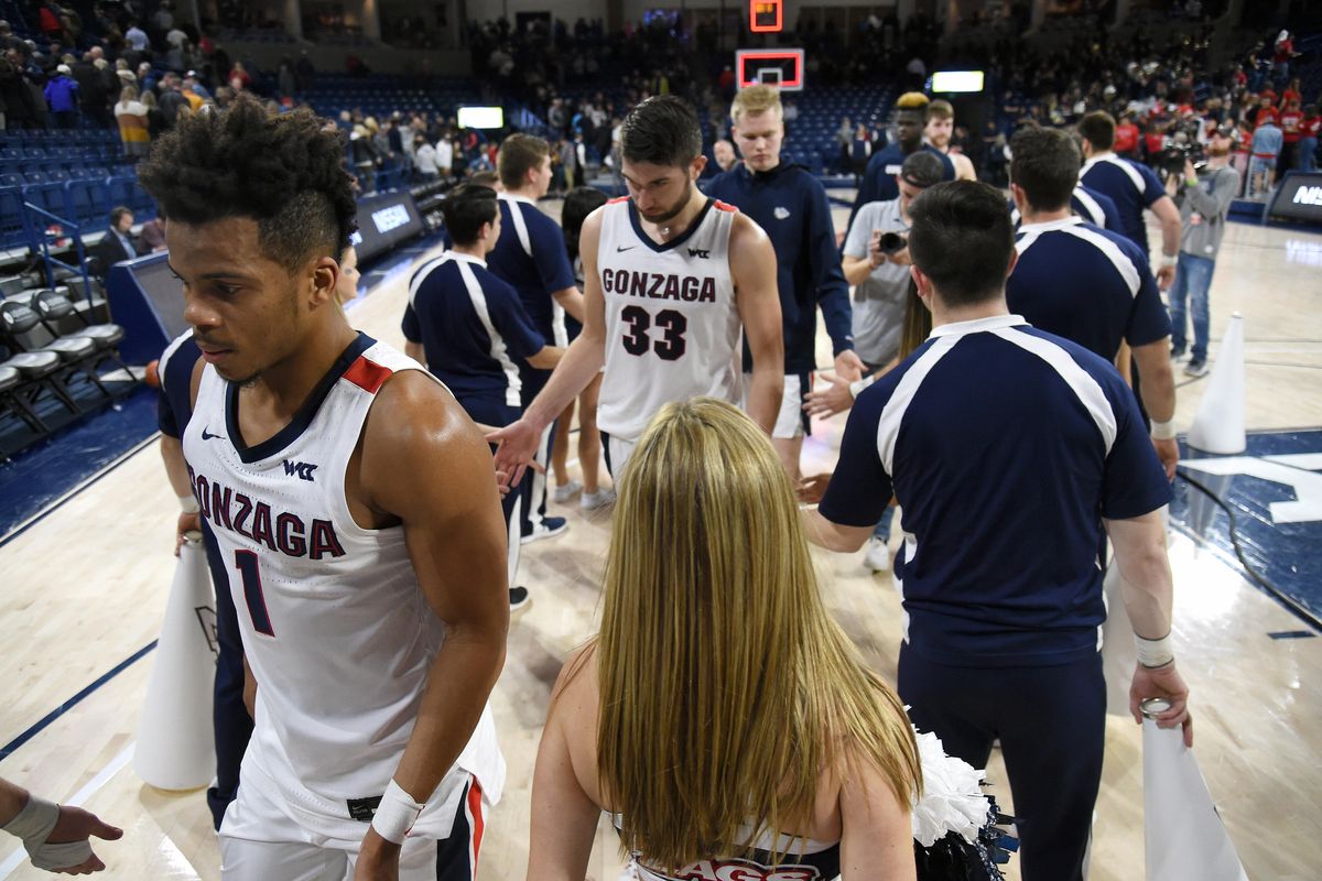 Gonzaga guard Admon Gilder (1) and Gonzaga forward Killian Tillie (33) leave the court with the team after defeating Texas Arlington 72-66, Tues., Nov. 19, 2019, at the McCarthey Athletic Center. (Colin Mulvany / The Spokesman-Review)