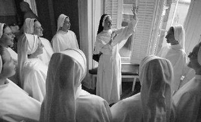 
Sister Catherine Marie Hopkins, center, of The Dominican Sisters of St. Cecilia Congregation, has a laugh with the novice sisters at St. Cecilia in Nashville, Tenn. 
 (Associated Press / The Spokesman-Review)