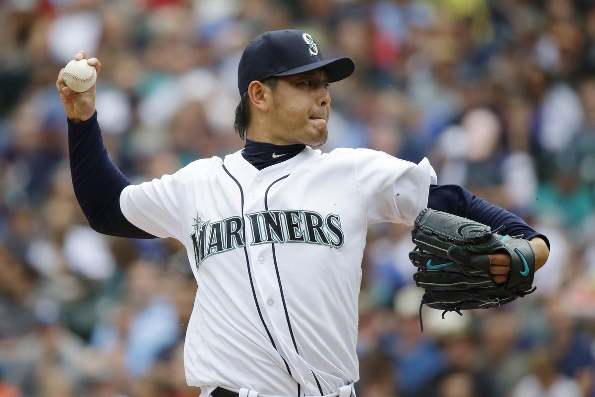 Mariners starting pitcher Hisashi Iwakuma held the Astros scoreless through seven innings on Saturday at Safeco Field. (Ted S. Warren / Associated Press)