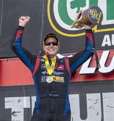 Funny Car driver Bob Tasca III celebrates his win in the final race at the NHRA Thunder Valley Nationals at Bristol Dragway in Bristol, Tenn., Sunday, June 16, 2019. (David Crigger / Associated Press)