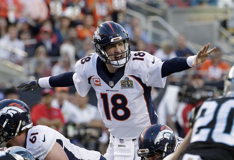 Peyton Manning became the first quarterback to win Super Bowls with two different franchises. (Matt York / Associated Press)