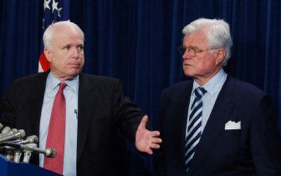 
Sen. John McCain, R-Ariz., and Sen. Ted Kennedy, D-Mass., right, discuss immigration reform in Washington May 12. McCain and Kennedy co-sponsored legislation that would create 400,000 three-year visas for guest workers.  
 (Associated Press / The Spokesman-Review)