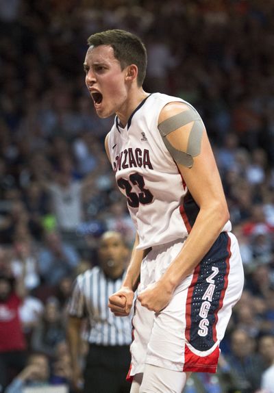 Kyle Wiltjer, battered in GU’s Saturday win, celebrates a second-half slam dunk.