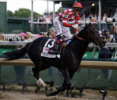 Jose Ortiz rides Serengeti Empress to victory during the 145th running of the Kentucky Oaks horse race at Churchill Downs Friday, May 3, 2019, in Louisville, Ky. (Kiichiro Sato / Associated Press)