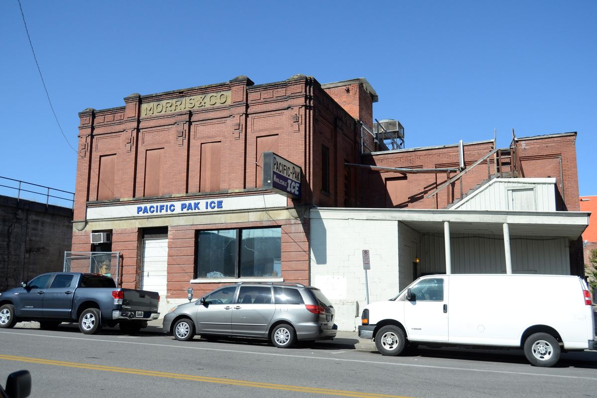 The old Morris and Co. building at 124 S. Jefferson, built in 1911 and seen here photographed Tuesday, July 30, 2019, has housed the Pacific Pak Wholesale Ice plant since 1969. For almost 60 years before that, it was a meat packing plant and where hanging beef sides would be unloaded from rail cars and carried through the building on hooks riding on steel rails from room to room. (Jesse Tinsley/THE SPOKESMAN-REVIEW / SR)