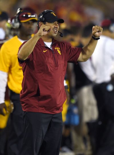 Coach Steve Sarkisian hopes his Trojans fare better against Stanford than his Huskies did. (Associated Press)