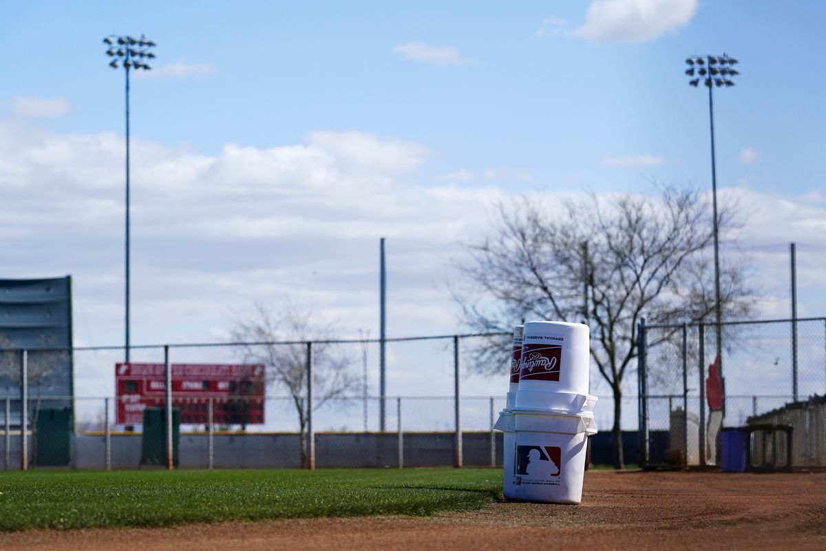 A practice field at the Cincinnati Reds spring training complex sits empty as pitchers and catchers are not starting spring training workouts as scheduled as the Major League Baseball lockout will prevent pitchers and catchers from taking the field for the first time since October Wednesday, Feb. 16, 2022, in Goodyear, Ariz.  (Ross D. Franklin)