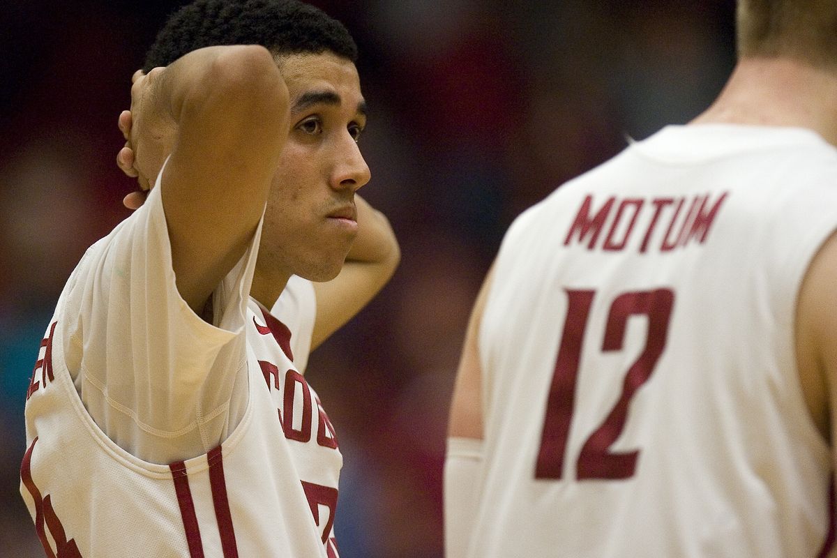 WSU’s Dexter Kernich-Drew, realizes his mistake after fouling the Ducks’ best free-throw shooter, forward E.J. Singler, with the scored tied and 3.8 seconds remaining in overtime. (Associated Press)