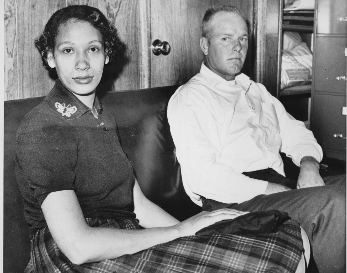 This Jan. 26, 1965 file photo shows Mildred Loving and her husband Richard P Loving. Fifty years after Mildred and Richard Lovings landmark legal challenge shattered the laws against interracial marriage in the U.S., some couples of different races still talk of facing discrimination, disapproval and sometimes outright hostility from their fellow Americans. (Associated Press)