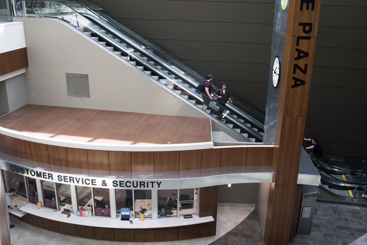 The escalators in the renovated STA Plaza have been moved from the center of the lobby to the south wall, and the Customer Service & Security kiosk was moved to a prominent spot in the central lobby. (Colin Mulvany / The Spokesman-Review)