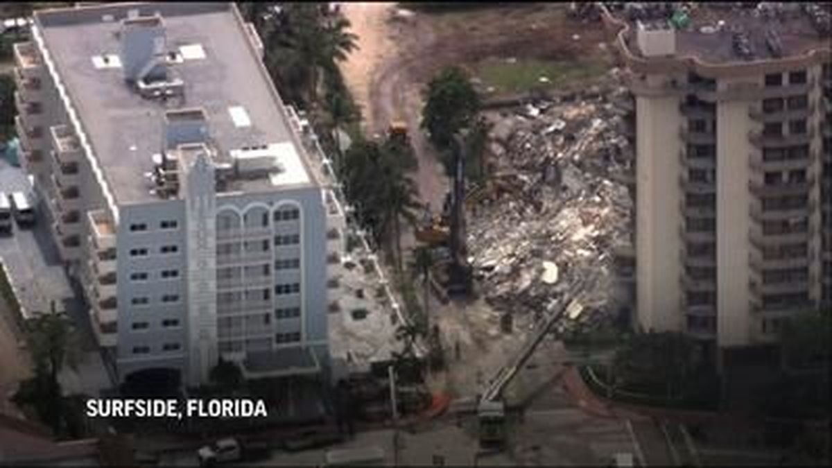 About 160 people were still unaccounted for Friday after an oceanside Florida condominium building collapsed. Searchers are using big machines and their hands to comb through a twisted, shifting heap of concrete and metal. 