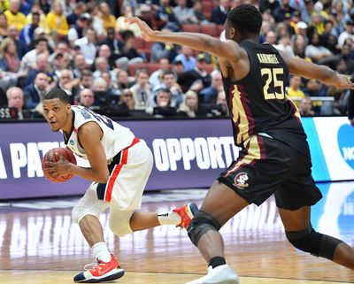 In this March 28, 2019 photo, Gonzaga guard Zach Norvell Jr. looks for an opening against Florida State forward Mfiondu Kabengele during a 2019 NCAA basketball tournament game at the Honda Center in Anaheim, Calif. (Tyler Tjomsland / The Spokesman-Review)