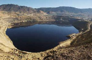 
Berkeley Pit, an open-pit copper mine that has been allowed to fill with water since its closure in 1982, is seen in this October 2003 photo. 
 (Associated Press / The Spokesman-Review)