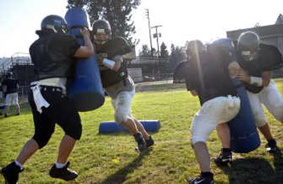 
The Valley Christian football team works on defense during practice at the school. The football program is a new addition to VCS athletics. 
 (Holly Pickett / The Spokesman-Review)