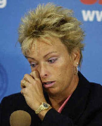 
 Dottie Pepper wipes tears as she announces her retirement plans. 
 (Associated Press / The Spokesman-Review)